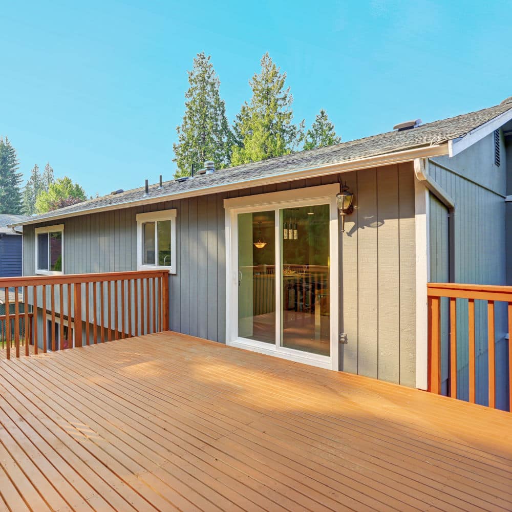 Empty walkout deck with redwood railings